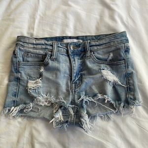 Klique B. Mid-high rise distressed denim shorts